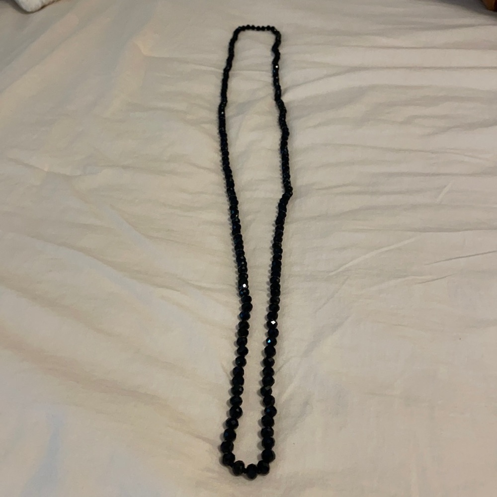 Long black bead necklace